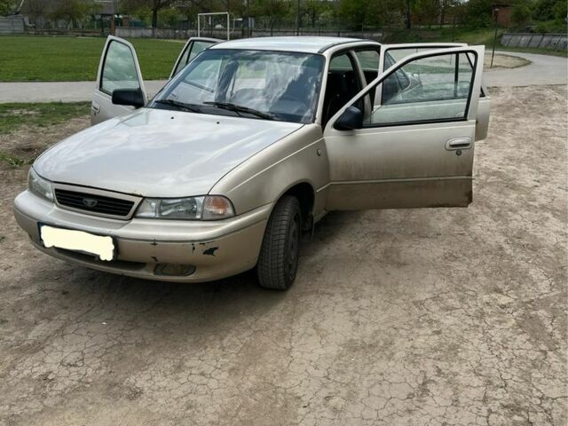 Бежевий Деу Нексія, об'ємом двигуна 1.6 л та пробігом 200 тис. км за 1100 $, фото 11 на Automoto.ua