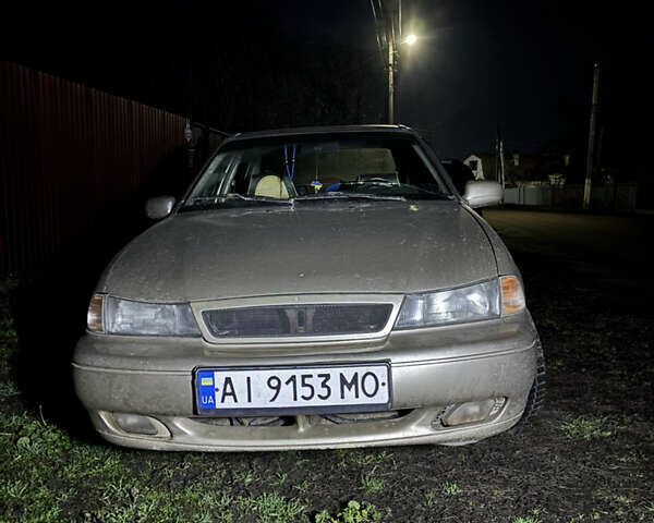 Бежевый Дэу Нексия, объемом двигателя 1.5 л и пробегом 498 тыс. км за 1417 $, фото 2 на Automoto.ua