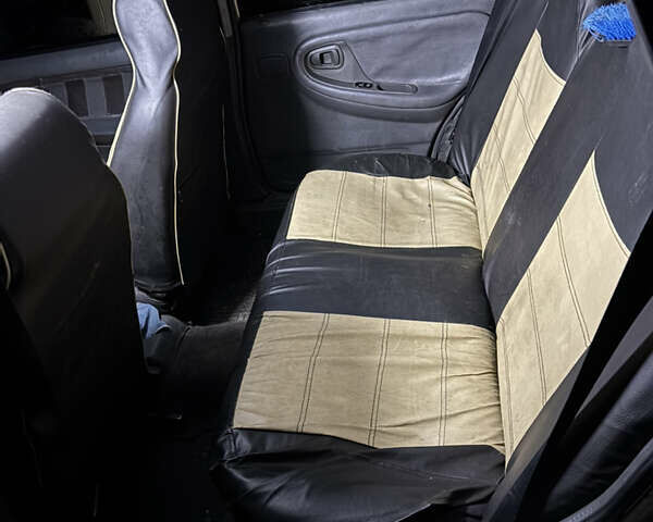 Бежевый Дэу Нексия, объемом двигателя 1.5 л и пробегом 498 тыс. км за 1417 $, фото 6 на Automoto.ua