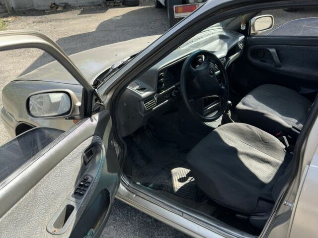 Бежевый Дэу Нексия, объемом двигателя 1.5 л и пробегом 280 тыс. км за 1000 $, фото 5 на Automoto.ua