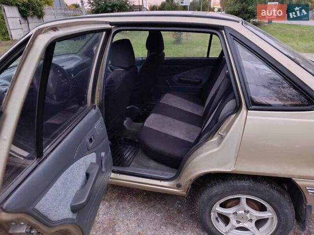 Бежевий Деу Нексія, об'ємом двигуна 1.5 л та пробігом 228 тис. км за 1200 $, фото 8 на Automoto.ua