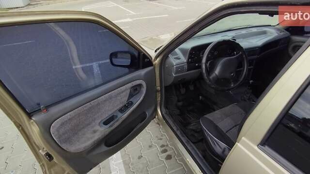 Бежевый Дэу Нексия, объемом двигателя 1.5 л и пробегом 230 тыс. км за 500 $, фото 5 на Automoto.ua