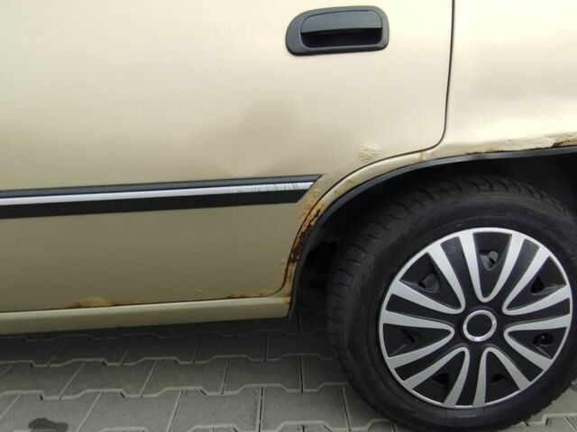 Бежевый Дэу Нексия, объемом двигателя 1.5 л и пробегом 230 тыс. км за 500 $, фото 7 на Automoto.ua