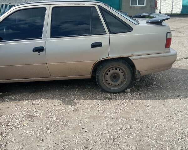 Бежевий Деу Нексія, об'ємом двигуна 1.5 л та пробігом 97 тис. км за 1700 $, фото 3 на Automoto.ua