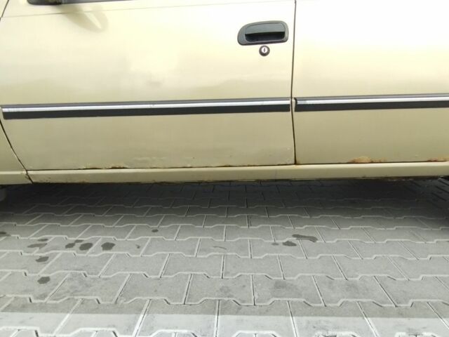 Бежевый Дэу Нексия, объемом двигателя 1.5 л и пробегом 230 тыс. км за 500 $, фото 4 на Automoto.ua