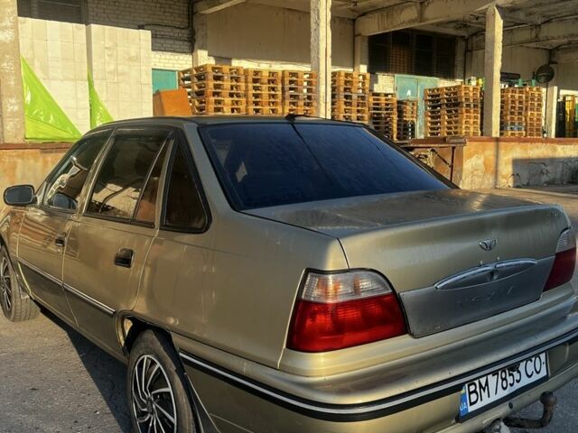 Бежевый Дэу Нексия, объемом двигателя 1.5 л и пробегом 263 тыс. км за 1450 $, фото 5 на Automoto.ua