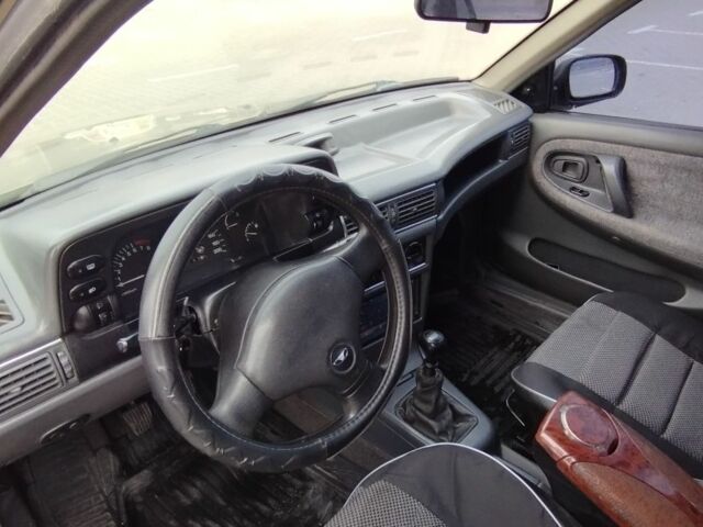 Бежевый Дэу Нексия, объемом двигателя 1.5 л и пробегом 230 тыс. км за 500 $, фото 12 на Automoto.ua