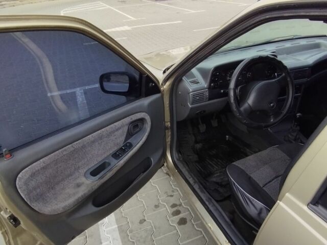 Бежевый Дэу Нексия, объемом двигателя 1.5 л и пробегом 230 тыс. км за 500 $, фото 15 на Automoto.ua