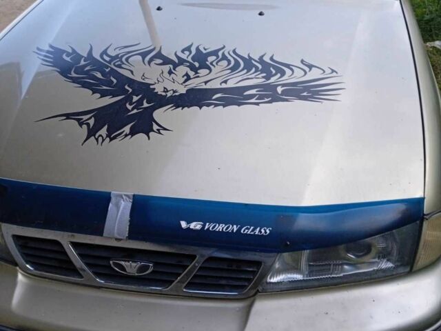 Бежевий Деу Нексія, об'ємом двигуна 1.5 л та пробігом 250 тис. км за 900 $, фото 1 на Automoto.ua