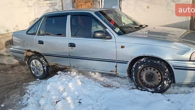 Бежевый Дэу Нексия, объемом двигателя 1.5 л и пробегом 260 тыс. км за 600 $, фото 1 на Automoto.ua