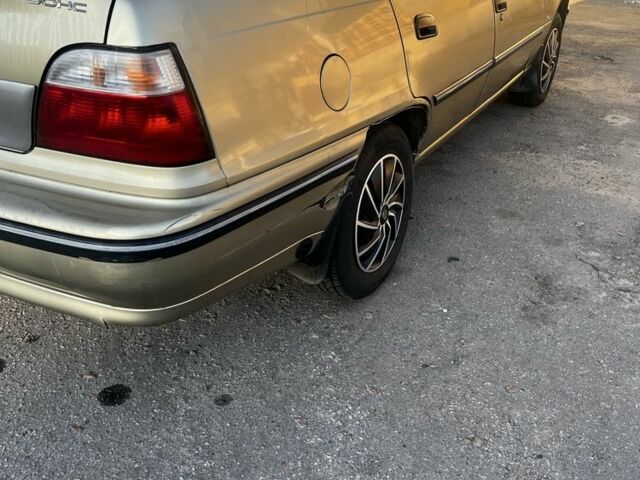 Бежевый Дэу Нексия, объемом двигателя 1.5 л и пробегом 263 тыс. км за 1450 $, фото 6 на Automoto.ua