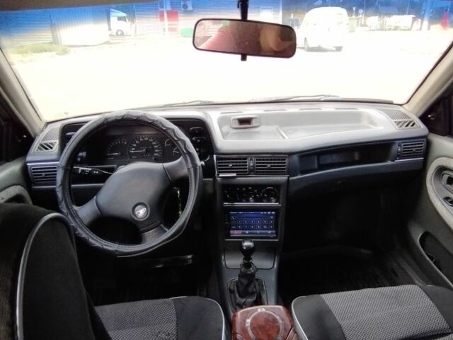 Бежевый Дэу Нексия, объемом двигателя 1.5 л и пробегом 230 тыс. км за 500 $, фото 13 на Automoto.ua