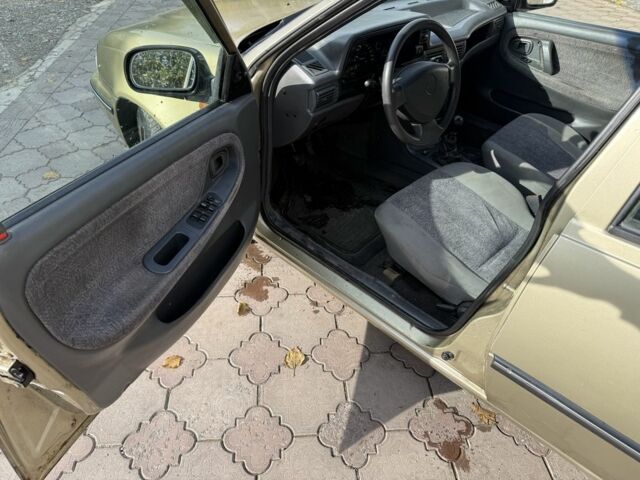 Деу Нексія 2006 у Дніпро (Дніпропетровську) на Automoto.ua Бежевий Деу Нексія, об'ємом двигуна 1.5 л та пробігом 186 тис. км за 1375 $, фото 9 на Automoto.ua