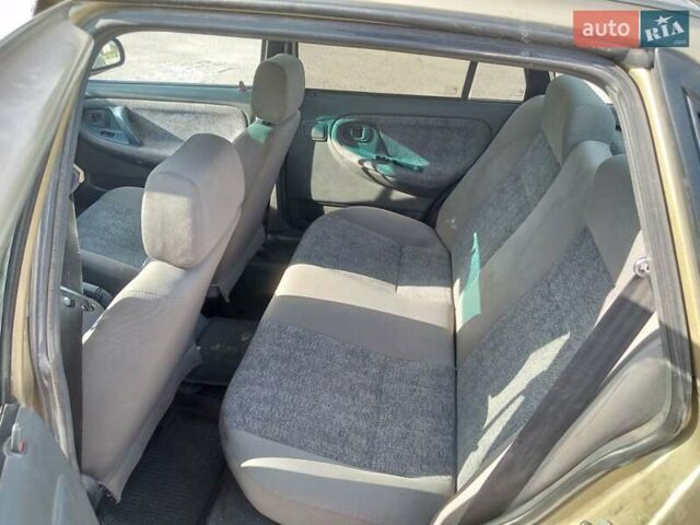 Бежевий Деу Нексія, об'ємом двигуна 1.5 л та пробігом 160 тис. км за 1650 $, фото 3 на Automoto.ua