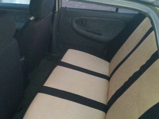 Бежевый Дэу Нексия, объемом двигателя 1.5 л и пробегом 137 тыс. км за 2100 $, фото 4 на Automoto.ua