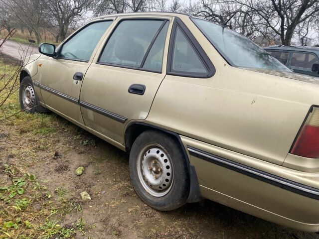 Бежевий Деу Нексія, об'ємом двигуна 1.5 л та пробігом 240 тис. км за 900 $, фото 2 на Automoto.ua