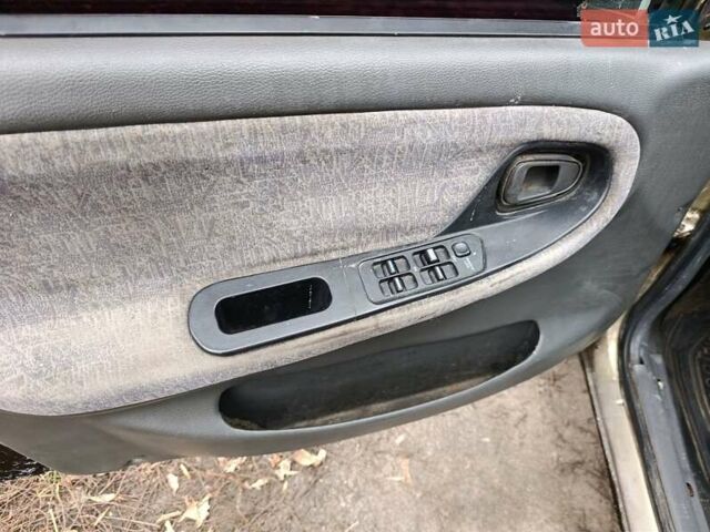 Бежевый Дэу Нексия, объемом двигателя 1.5 л и пробегом 277 тыс. км за 1000 $, фото 5 на Automoto.ua