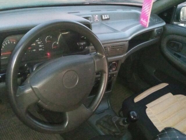 Бежевый Дэу Нексия, объемом двигателя 1.5 л и пробегом 137 тыс. км за 2100 $, фото 3 на Automoto.ua