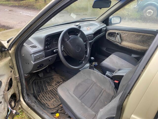 Бежевий Деу Нексія, об'ємом двигуна 1.5 л та пробігом 240 тис. км за 900 $, фото 4 на Automoto.ua