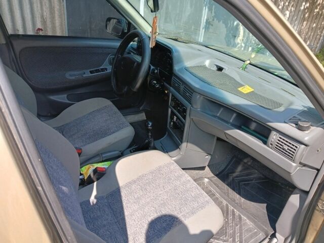 Бежевий Деу Нексія, об'ємом двигуна 1.5 л та пробігом 203 тис. км за 1650 $, фото 5 на Automoto.ua