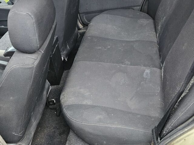 Бежевый Дэу Нексия, объемом двигателя 1.5 л и пробегом 234 тыс. км за 1150 $, фото 4 на Automoto.ua