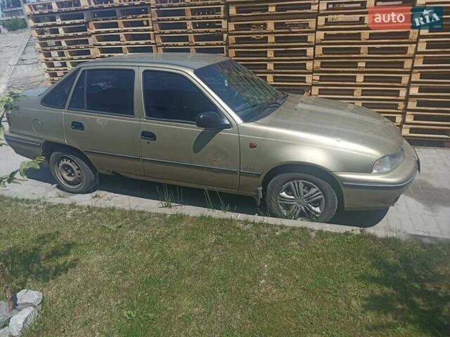 Бежевий Деу Нексія, об'ємом двигуна 1.6 л та пробігом 213 тис. км за 1750 $, фото 2 на Automoto.ua