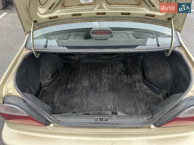 Бежевий Деу Нексія, об'ємом двигуна 1.5 л та пробігом 301 тис. км за 1800 $, фото 4 на Automoto.ua
