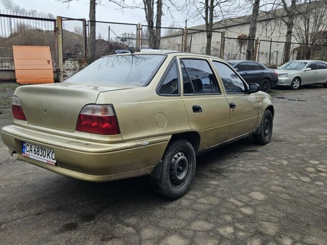 Бежевый Дэу Нексия, объемом двигателя 1.5 л и пробегом 234 тыс. км за 1150 $, фото 3 на Automoto.ua