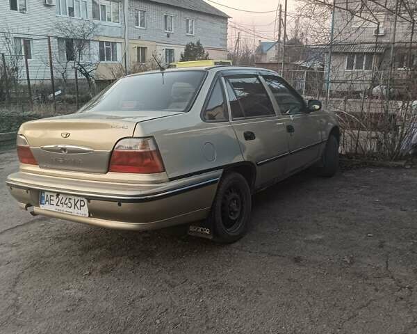 Бежевый Дэу Нексия, объемом двигателя 1.6 л и пробегом 280 тыс. км за 1667 $, фото 3 на Automoto.ua