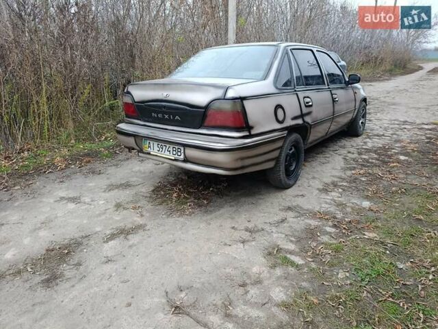 Бежевый Дэу Нексия, объемом двигателя 1.5 л и пробегом 277 тыс. км за 1000 $, фото 6 на Automoto.ua