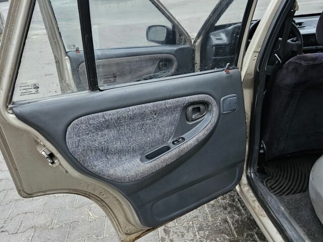 Бежевый Дэу Нексия, объемом двигателя 0 л и пробегом 260 тыс. км за 750 $, фото 11 на Automoto.ua