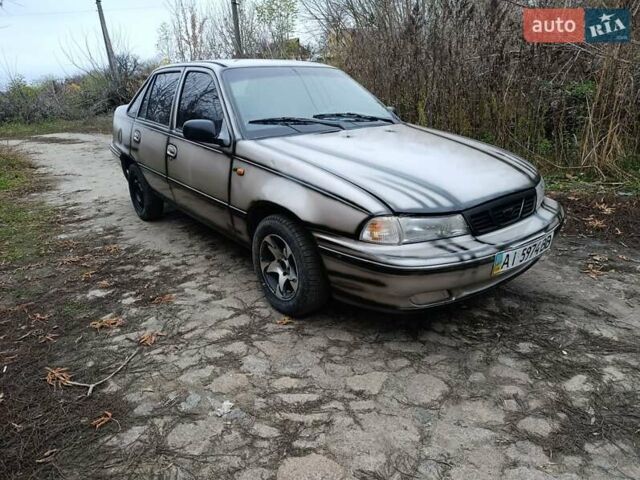 Бежевый Дэу Нексия, объемом двигателя 1.5 л и пробегом 277 тыс. км за 1000 $, фото 9 на Automoto.ua