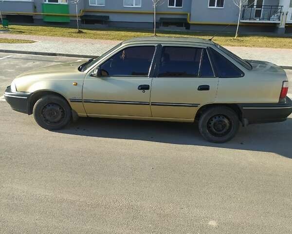 Бежевый Дэу Нексия, объемом двигателя 1.5 л и пробегом 250 тыс. км за 2000 $, фото 10 на Automoto.ua