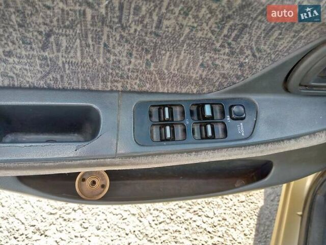 Бежевий Деу Нексія, об'ємом двигуна 1.5 л та пробігом 160 тис. км за 1650 $, фото 5 на Automoto.ua