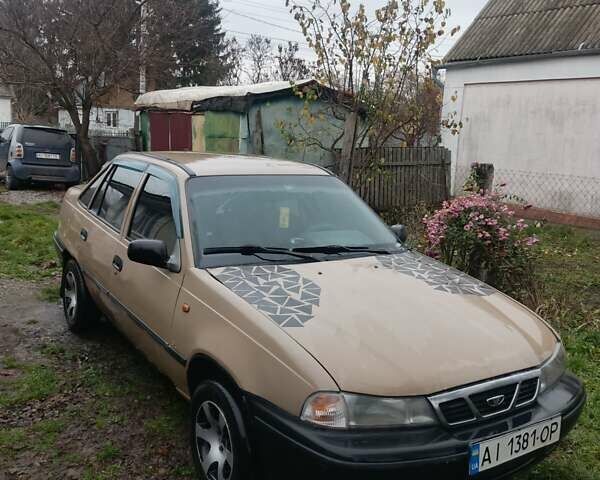 Бежевий Деу Нексія, об'ємом двигуна 1.5 л та пробігом 277 тис. км за 999 $, фото 4 на Automoto.ua