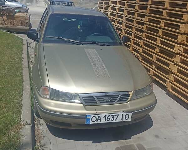 Бежевий Деу Нексія, об'ємом двигуна 1.6 л та пробігом 213 тис. км за 1750 $, фото 3 на Automoto.ua