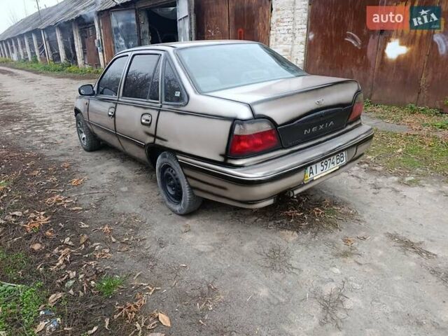 Бежевый Дэу Нексия, объемом двигателя 1.5 л и пробегом 277 тыс. км за 1000 $, фото 8 на Automoto.ua