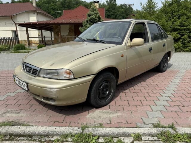 Бежевий Деу Нексія, об'ємом двигуна 1.5 л та пробігом 257 тис. км за 650 $, фото 6 на Automoto.ua