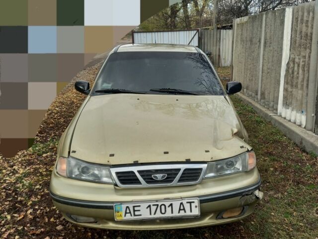 Бежевый Дэу Нексия, объемом двигателя 1.6 л и пробегом 157 тыс. км за 1000 $, фото 3 на Automoto.ua