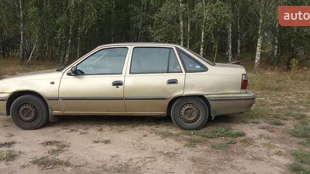 Бежевый Дэу Нексия, объемом двигателя 1.5 л и пробегом 230 тыс. км за 1299 $, фото 6 на Automoto.ua