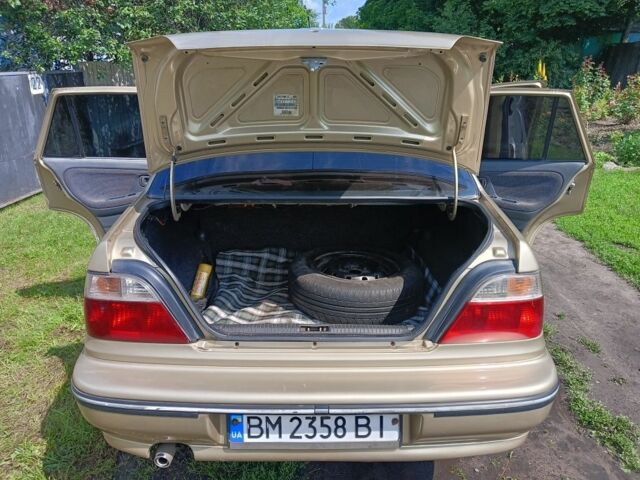 Бежевий Деу Нексія, об'ємом двигуна 1.5 л та пробігом 203 тис. км за 1650 $, фото 6 на Automoto.ua