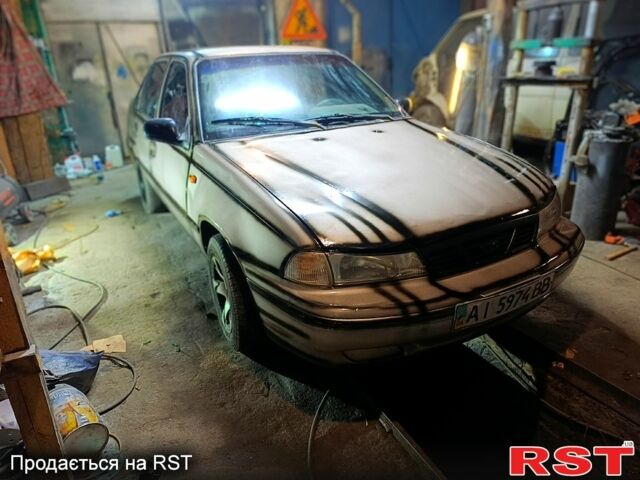 Бежевый Дэу Нексия, объемом двигателя 1.5 л и пробегом 277 тыс. км за 999 $, фото 3 на Automoto.ua