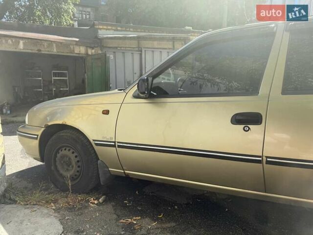 Бежевий Деу Нексія, об'ємом двигуна 1.5 л та пробігом 126 тис. км за 1700 $, фото 3 на Automoto.ua
