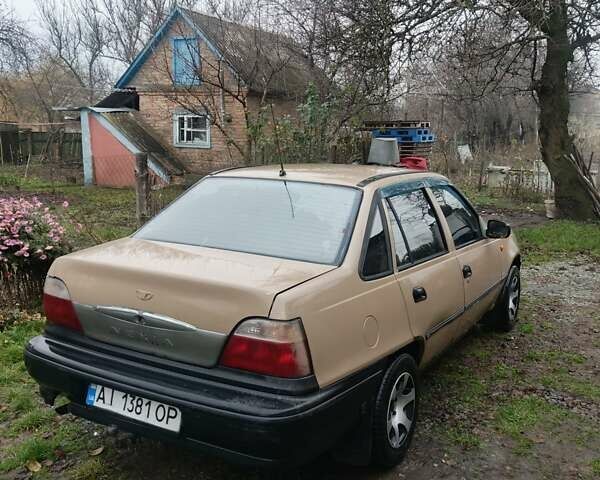 Бежевий Деу Нексія, об'ємом двигуна 1.5 л та пробігом 277 тис. км за 999 $, фото 5 на Automoto.ua