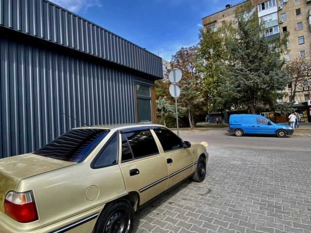 Бежевий Деу Нексія, об'ємом двигуна 1.6 л та пробігом 122 тис. км за 1300 $, фото 4 на Automoto.ua