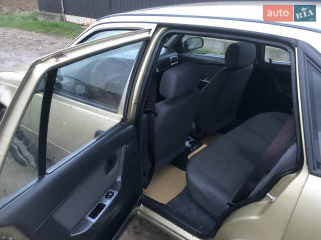 Бежевий Деу Нексія, об'ємом двигуна 1.6 л та пробігом 171 тис. км за 1550 $, фото 19 на Automoto.ua
