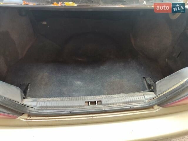 Бежевий Деу Нексія, об'ємом двигуна 1.5 л та пробігом 200 тис. км за 1450 $, фото 12 на Automoto.ua