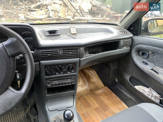 Бежевий Деу Нексія, об'ємом двигуна 1.5 л та пробігом 165 тис. км за 1200 $, фото 8 на Automoto.ua