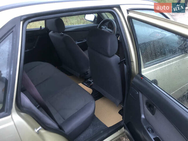 Бежевий Деу Нексія, об'ємом двигуна 1.6 л та пробігом 171 тис. км за 1550 $, фото 20 на Automoto.ua