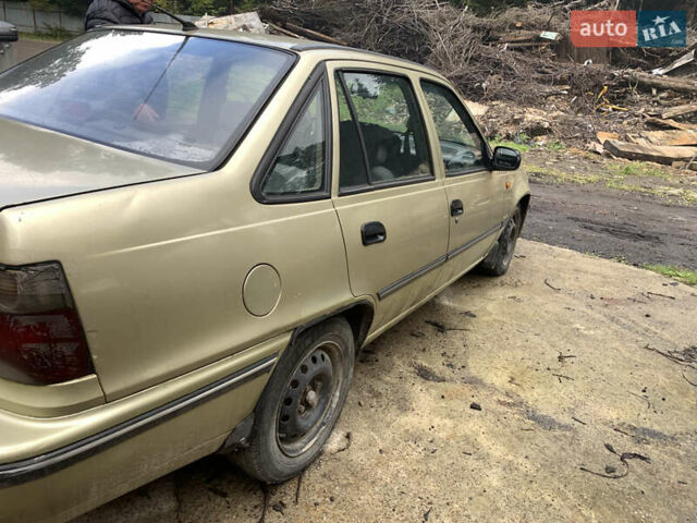 Бежевий Деу Нексія, об'ємом двигуна 1.5 л та пробігом 165 тис. км за 1200 $, фото 1 на Automoto.ua